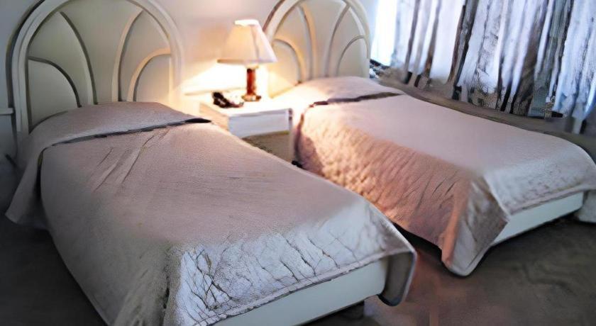 Richmond Plaza Hotel Tabok Buitenkant foto