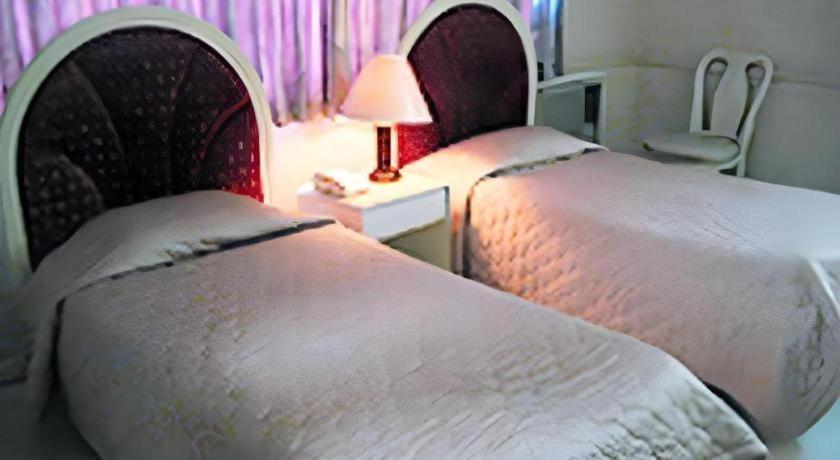 Richmond Plaza Hotel Tabok Buitenkant foto